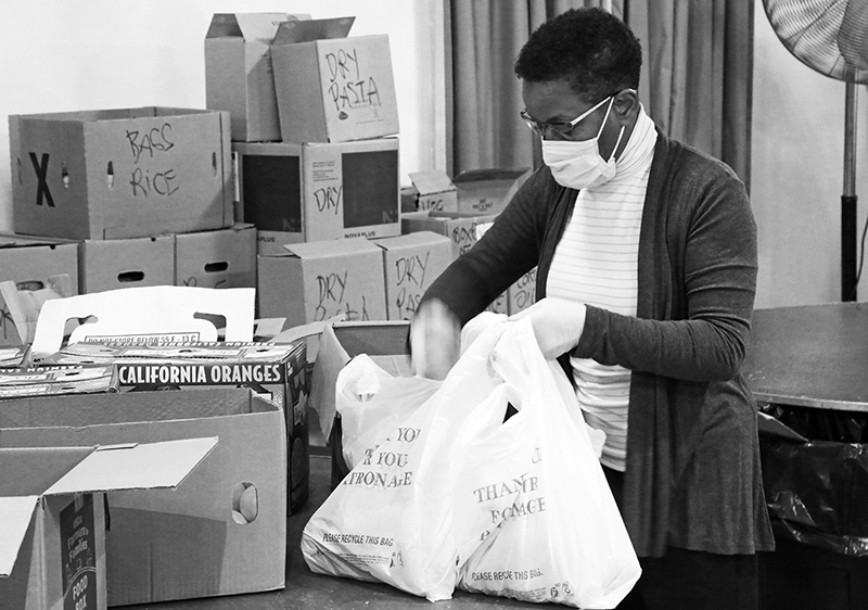 2020 : Food Lines : Seventh Day Adventists Help the Needy : Streetlife : New York City : Times Square : Richard Moore : Photographer : Photojournalist